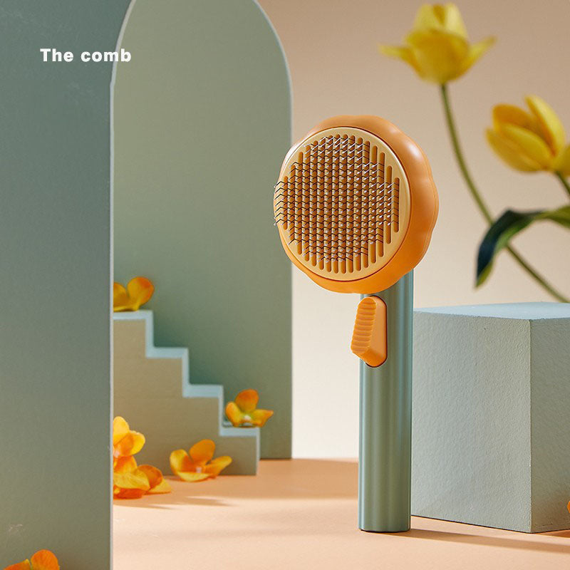 Pet brush with a hair removal and massage system.
